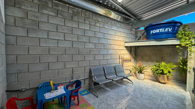 Área de espera com espaço infantil